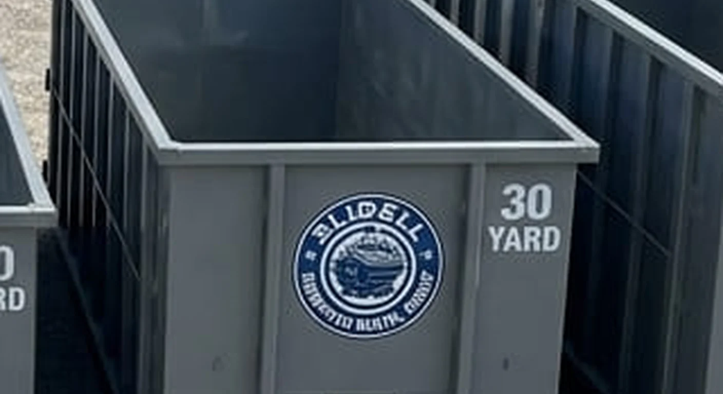 30 Yard Dumpster Rental in Slidell, LA A Slidell Dumpster Rental Group 30 yard roll-off dumpster, part of a five-container size lineup with the size printed on the side